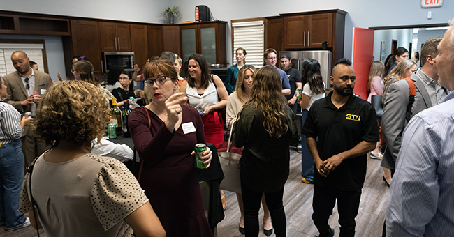 Guests gather in the STN kitchen before the taping of It Happens at STN: Episode 8 on May 4, 2023 (STN / Brett Haehl)