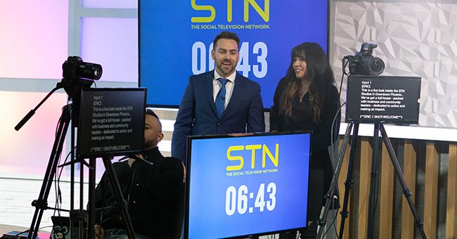 Host Eric Sperling and Production Assistant Kat Aparicio share a laugh during the taping of Episode 6 of It Happens at STN, March 2, 2023 (STN/Brett Haehl)